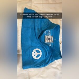 PINK Victoria's Secret Turquoise Skirt with Peace Emblem